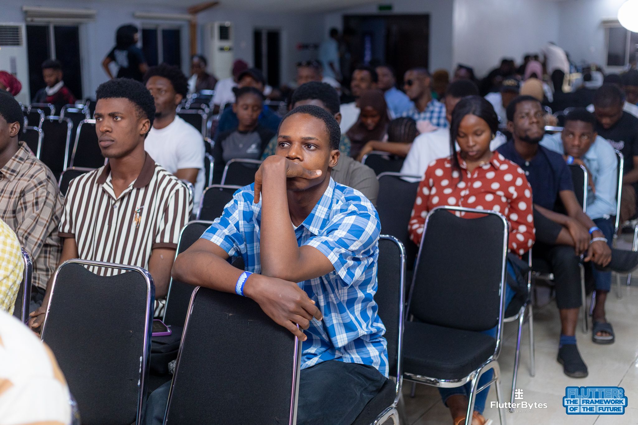 Attendees listening to the talk